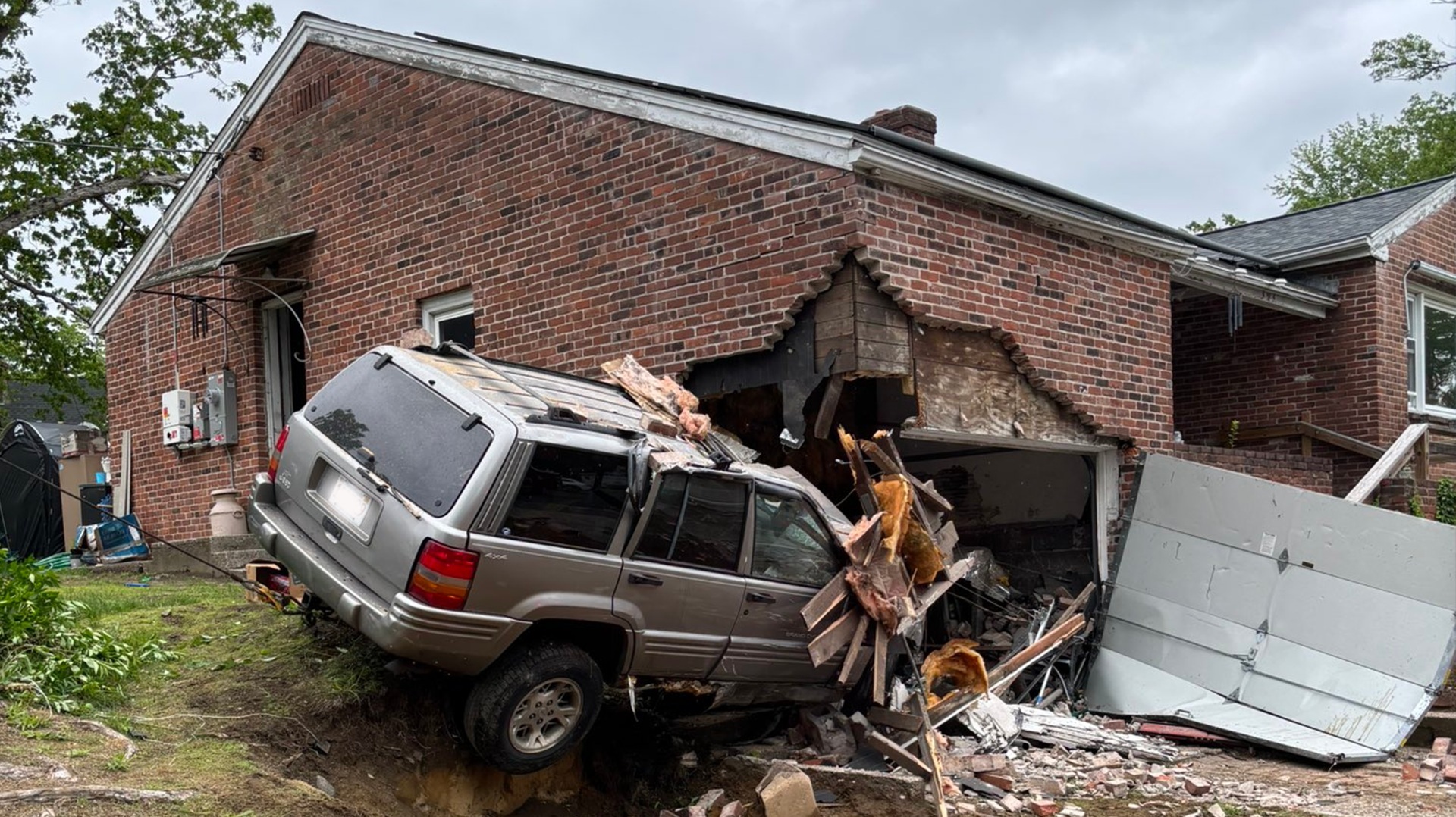 Vehicle impact into brick home damaging exterior wall